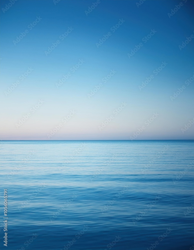 Fototapeta premium Blue ocean with a small boat in the distance