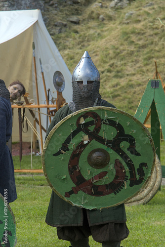 viking with green shield ready for battle photo