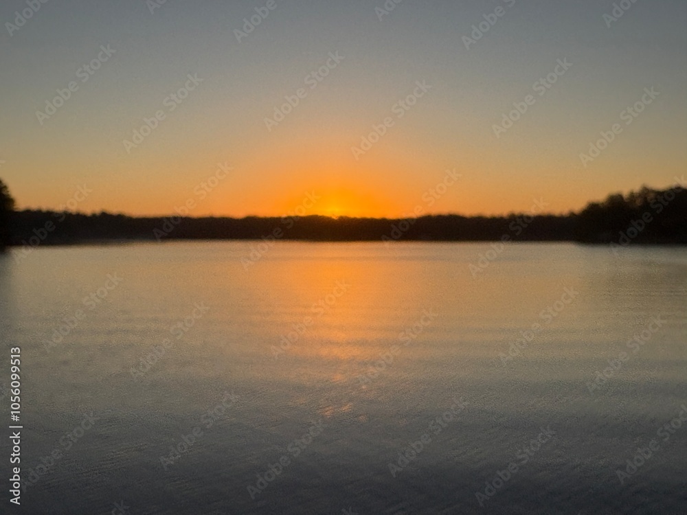 Sunset lake view summer evening water reflection
