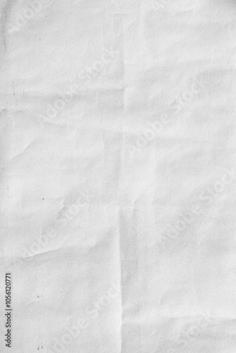 Crumpled Old grey paper with folded crease