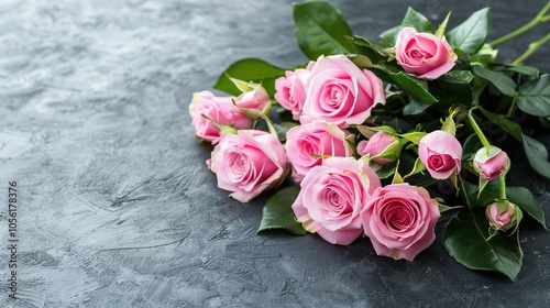 Beautiful_bouquet_of_pink_roses_flowers_on_a_dark