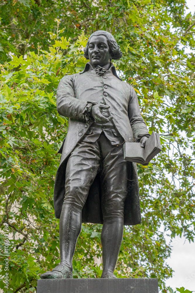 Statue in honor of Robert Raikes in Victoria Embankment garden in central London.UK. Statue in honor of Robert Raikes in Victoria Embankment garden in central London.UK.