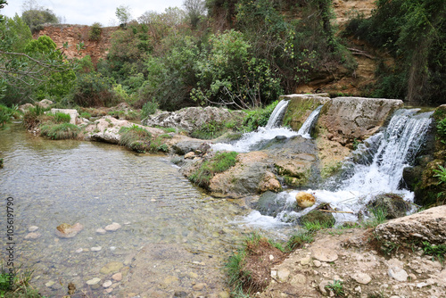 The Gorgo de la Escalera waterfall in Anna town photo