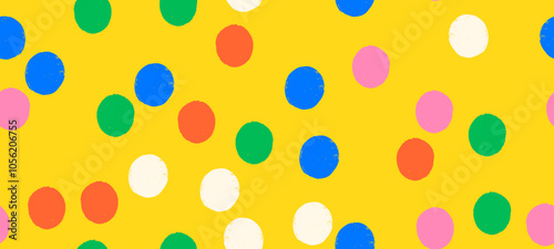 Whimsical seamless vector polka dot pattern with playful crayon spots and colorful confetti. Primary colored design for party or carnival yellow background.
