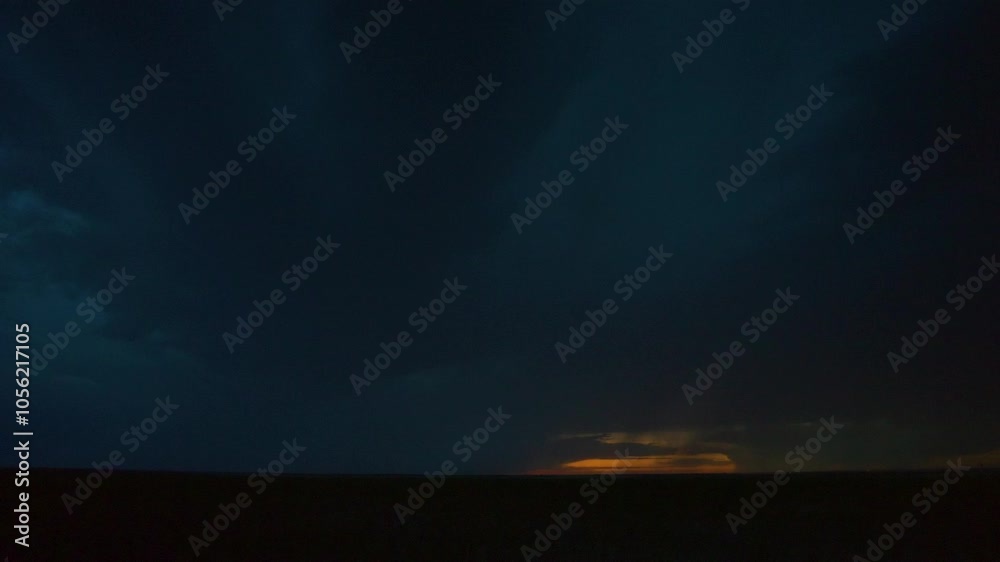 Bolts of lightning under dark storm clouds as day light fades away. Bolts of lightning under dark storm clouds as day light fades away.