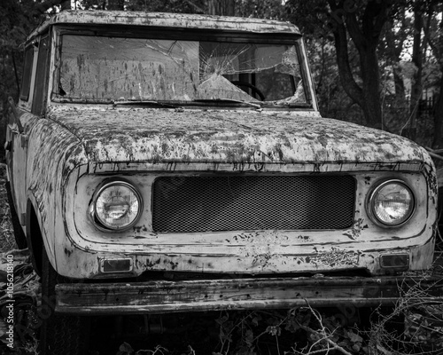 Old Scout: An old sixties era 4x4 sport utility vehicle is broken and abandoned.
