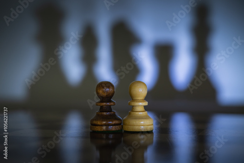 Chess pieces symbolize geopolitical and social relations. Their positions and shadows allow viewers to create their own metaphors and associations. Ideal for various descriptions of social relatitions photo