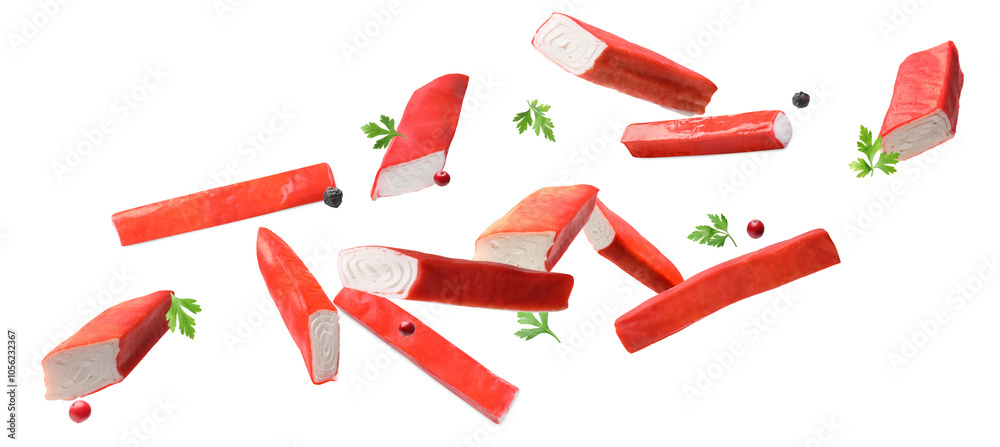 Φωτογραφία Crab stick pieces, parsley and mix of peppers in air on white background