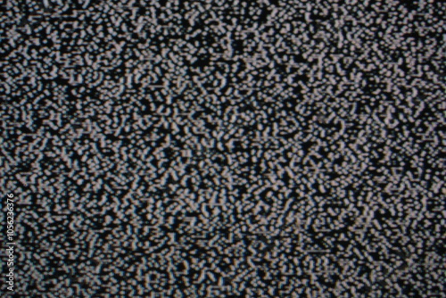 copy space , background. Old technology. Vintage television  Analog Static Noise texture. Monochrome, offset flickering noise. Screen damage TV effects and artefacts. photo