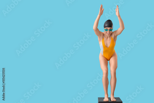 Young female swimmer on spr...