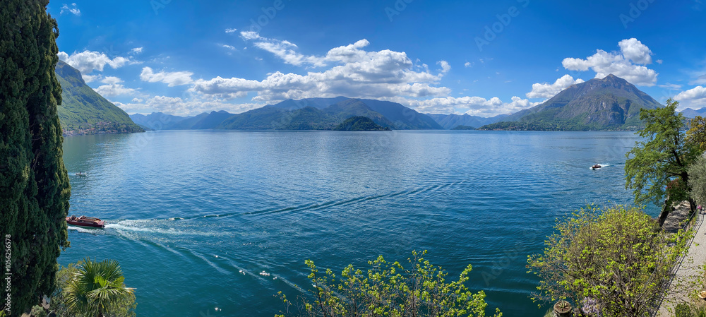 Scenic view of Lake Como, Italy and its southastern branch looking south with Fiumelatte (left) against blue sky with clouds