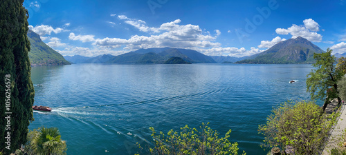 Obraz na płótnie Scenic view of Lake Como, Italy and its southastern branch looking south with Fiumelatte (left) against blue sky with clouds w salonie