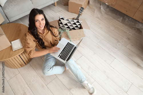 Beautiful woman using lapto...