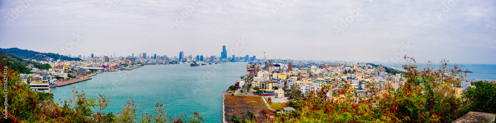 Fototapeta premium Kaohsiung, Taiwan, Republic of China, 01 25 2024: The landscape of Kaosiung port harbor, downtown, shiziwan (siziwan, xiziwan), and shoushan mountain seen from Qijin lighthouse