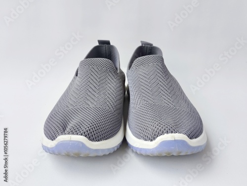 Grey slip-on sneakers for casual wear isolated on white background 