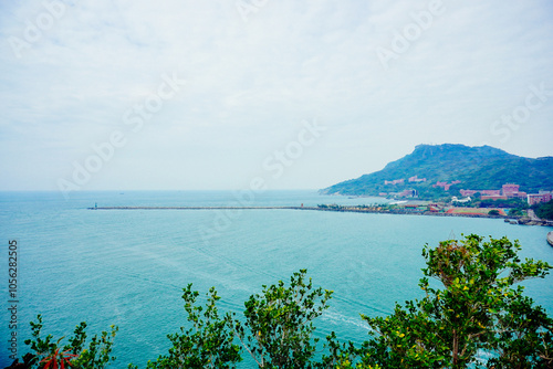 Kaohsiung, Taiwan, Republic of China, 01 25 2024: The landscape of Kaosiung port harbor, downtown, shiziwan (siziwan, xiziwan), and shoushan mountain seen from Qijin lighthouse