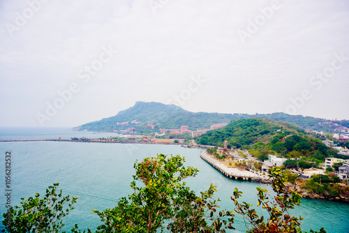 Kaohsiung, Taiwan, Republic of China, 01 25 2024: The landscape of Kaosiung port harbor, downtown, shiziwan (siziwan, xiziwan), and shoushan mountain seen from Qijin lighthouse photo