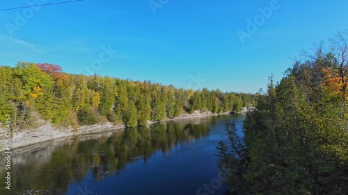 View at south of Trent River falls from Ranney Gorge Suspension Bridge in Campbellford town. Trent River in southeastern Ontario flows from Rice Lake into the Bay of Quinte on Lake Ontario. photo