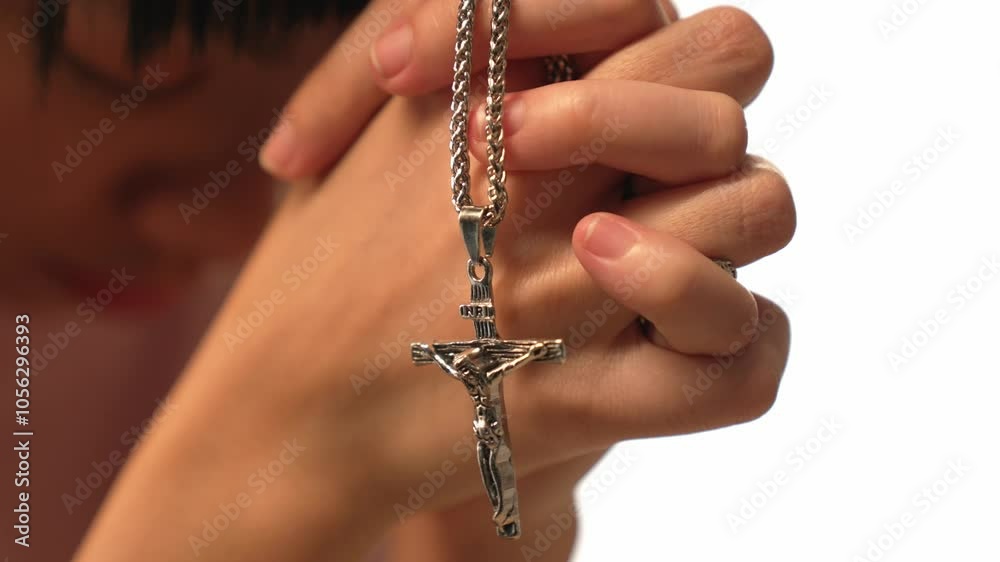 Sense of devotion and spiritual fulfill with christian catholic follower immerse in faith. Slow motion christian holding holy cross while praying to worship the god. Burgeoning Sense of devotion and spiritual fulfill with christian catholic follower immerse in faith. Slow motion christian holding holy cross while praying to worship the god. Burgeoning