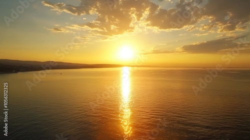 Serene Sunset Over Calm Ocean Waters