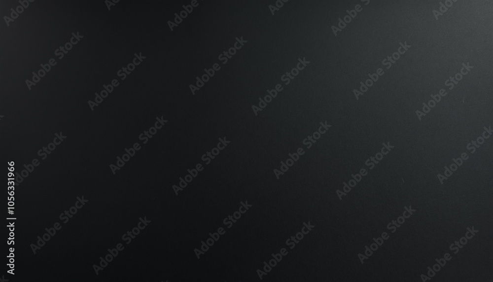 Smooth black paper surface with a slight sheen, reflecting soft light to emphasize its elegant texture and fine grain