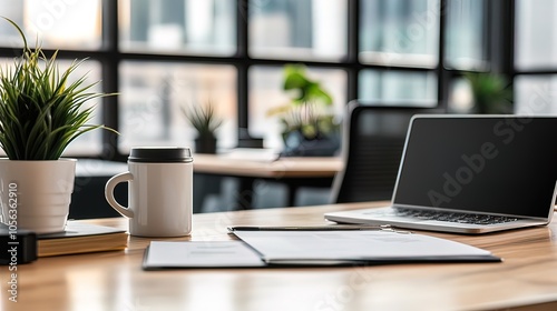 Modern Office Workspace with Laptop and Coffee Cup