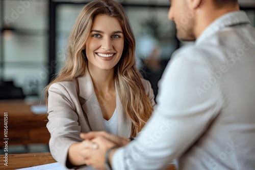 Happy Businesswoman Shaking Hands with Businessman in Office. Successful Deal and Collaboration. Smiling Mid Aged Female Manager Meeting Client at Work.