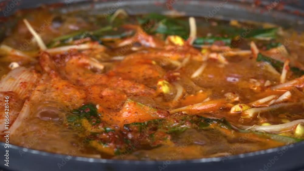 Spicy fish stew with bean sprouts and vegetables