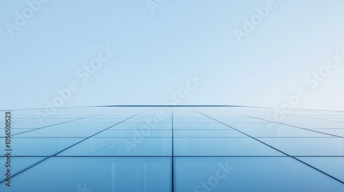 Modern Glass Skyscraper Reflecting Blue Sky