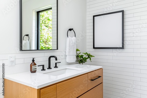 Modern bathroom featuring a sleek sink and wooden cabinetry with natural lighting enhancing the serene atmosphere.