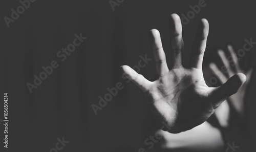 Close up of  woman showing stop gesture with hand blurred background. Stop violence against women. Intimidation and abuse of women.  Physical and psychological harassment.