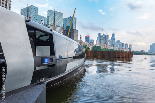 Photography Modern eco-friendly transport: the futuristic river tram runs along the Moskva River