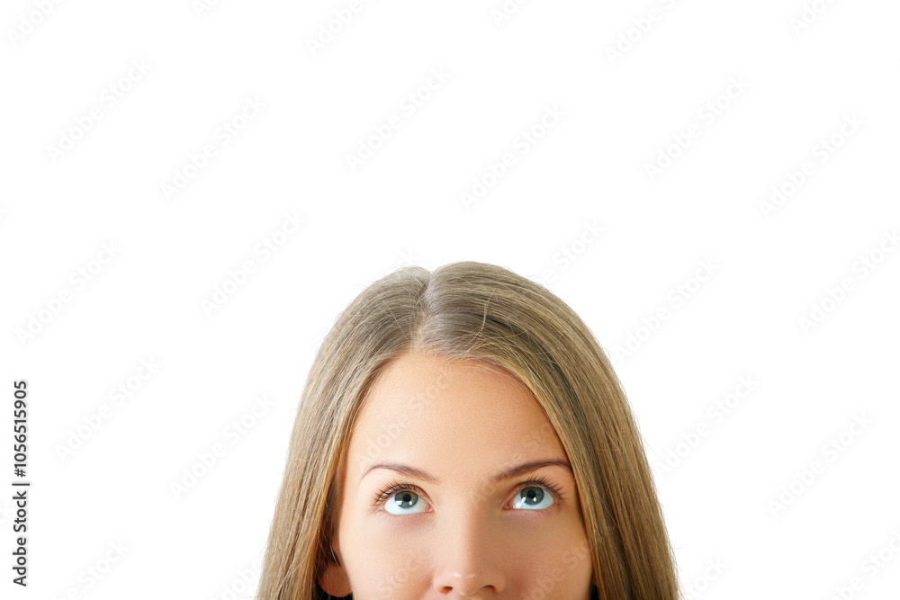 Woman's face looking upwards isolated on white background. Close-up of eyes and forehead. Concept of curiosity or contemplation Woman's face looking upwards isolated on white background. Close-up of eyes and forehead. Concept of curiosity or contemplation