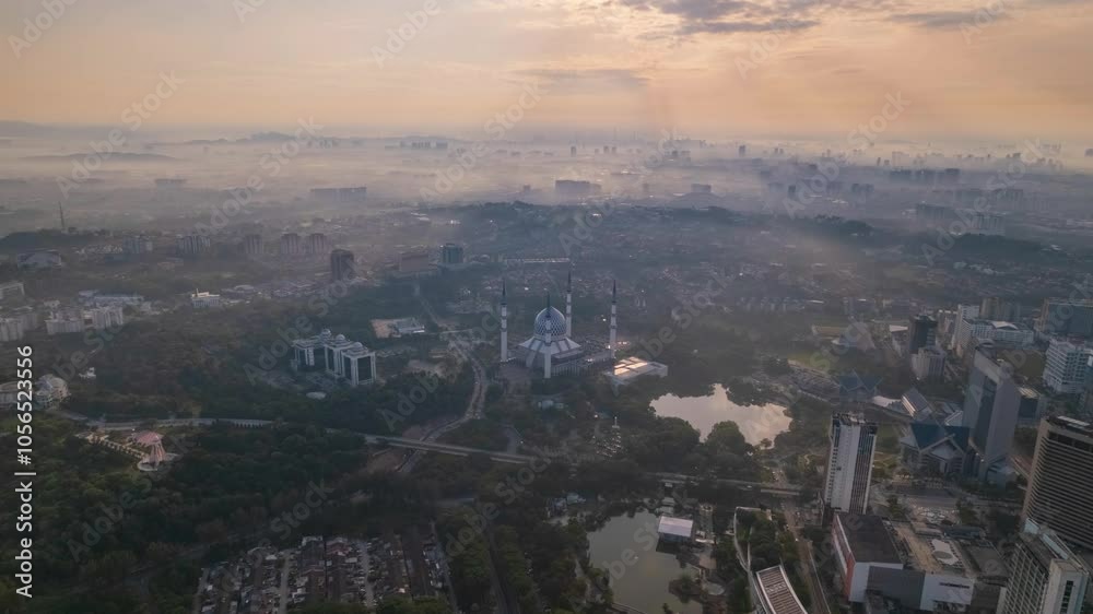 The majestic mosque stands as a beacon amidst the urban landscape, a testament to Malaysian architecture. The majestic mosque stands as a beacon amidst the urban landscape, a testament to Malaysian architecture.