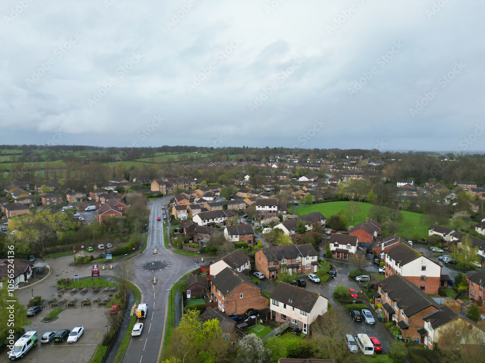Fototapeta premium Aerial View of Central City Centre Elstree Uxbridge London City of England, Great Britain. It Was Rainy and Cloudy Day with Strong Winds over England, High Angle Drone's Camera Footage. April 4th, 24