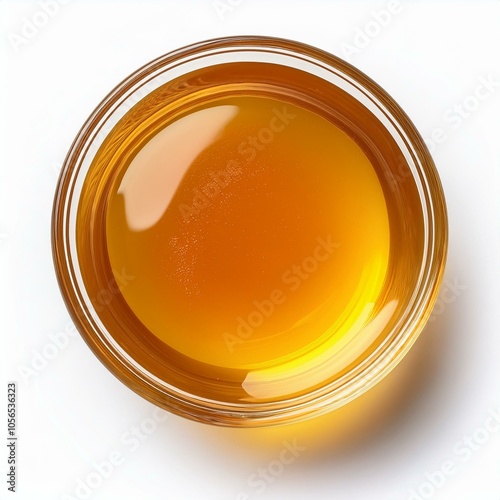 Bowl of rich, golden honey isolated on white, perfect for natural ingredient, culinary, and food-themed designs