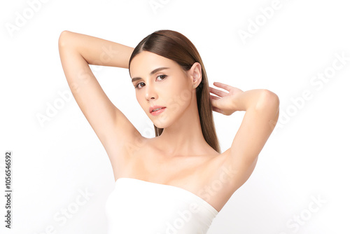 Beautiful Young Asian woman lifting hands up to show off clean and hygienic armpits or underarms on white background, Smooth armpit cleanliness and protection concept