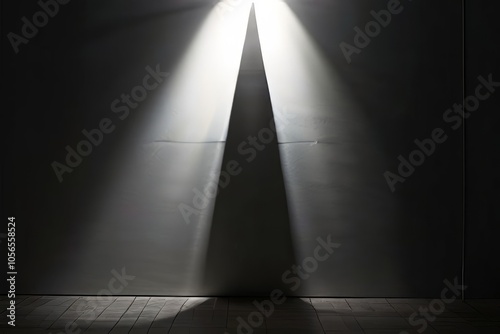 a vertically ascending shadow implying a light source from below photo