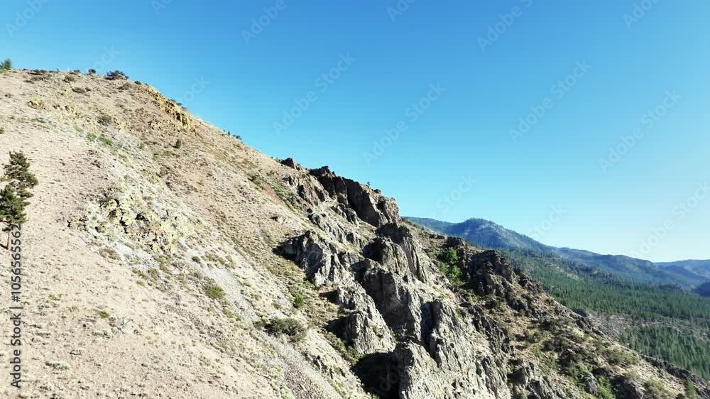 Landscape aerial view of Sierra Nevada Mountain range in the USA with blue clear sky