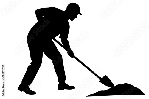 Silhouette of a man digging the ground with a shovel.