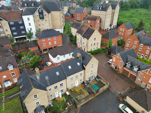 High Angle View of City of Colchester, Essex, England United Kingdom. Aerial Footage Was Captured with Drone's Camera During Rainy and Cloudy Day of May 21st, 2024 from Medium High Altitude. photo