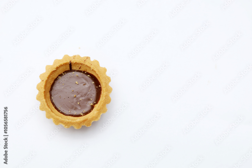 Tart chocolate isolated on white, selective focus on subject Tart chocolate isolated on white, selective focus on subject