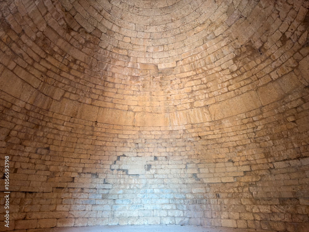 Interior of Clytemnestra Tomb at the Mycenae archaeological site, Greece. Mycenaean stone tholos roof indoor