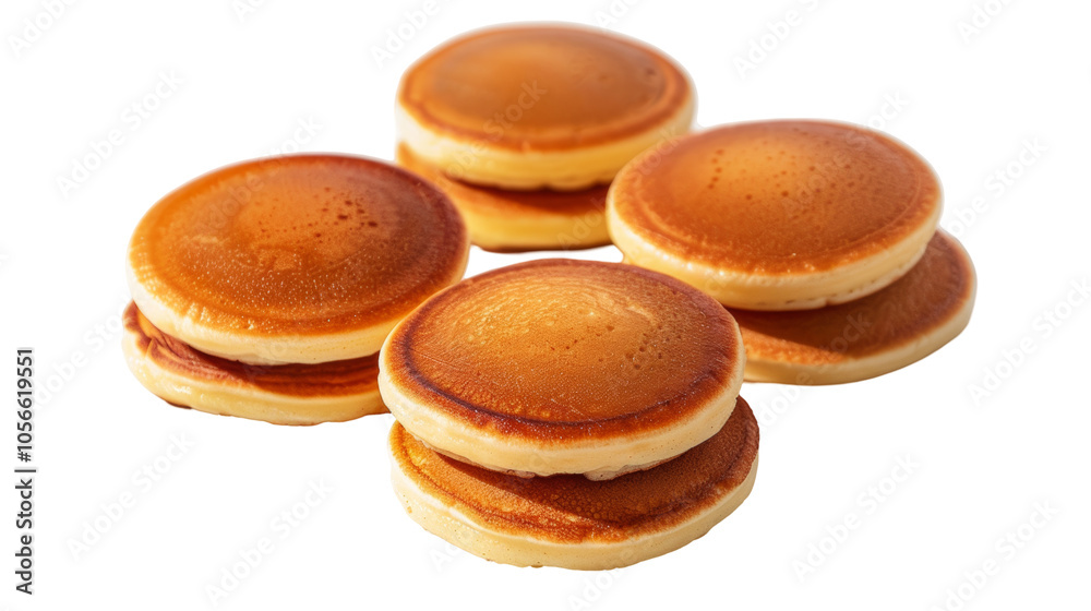 A vibrant display of Dorayaki cakes, each composed of soft, golden-brown pancakes with a rich center layer, capturing the essence of this beloved Japanese treat.