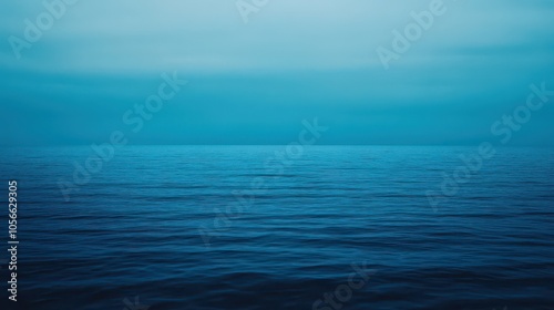 Wallpaper Mural Tranquil blue ocean water with serene waves, reflecting a calm sky. Ideal for relaxation and nature-themed projects. Torontodigital.ca