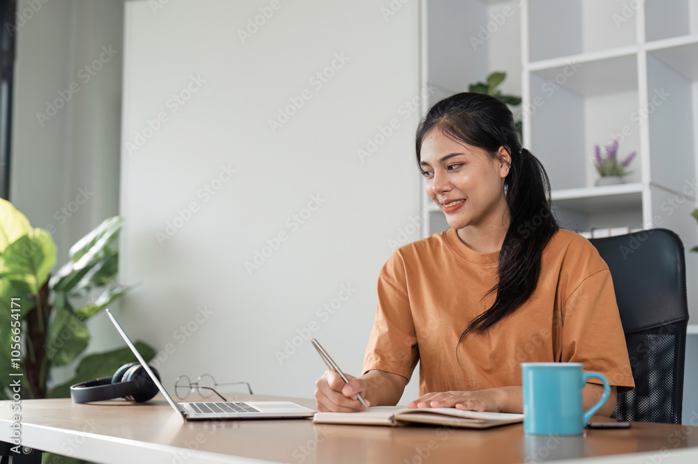 Young Girl Studying Online from Home with Laptop and Notebook in Modern Home Office Setting Young Girl Studying Online from Home with Laptop and Notebook in Modern Home Office Setting
