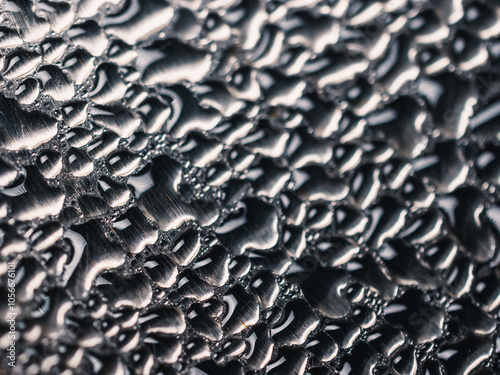 Water droplets on a metal surface