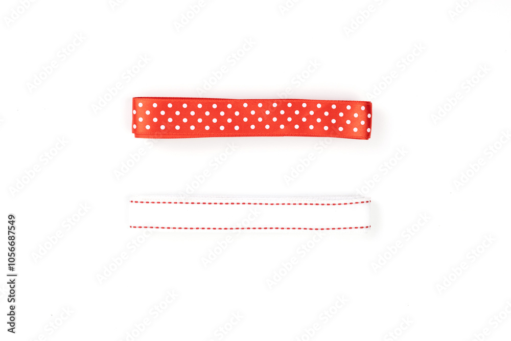 White fabric ribbon and red polka dots isolated on a white background. concept for happy birthday, thank you, congratulation, mother's day, anniversary, Valentine's day, and holiday... White fabric ribbon and red polka dots isolated on a white background. concept for happy birthday, thank you, congratulation, mother's day, anniversary, Valentine's day, and holiday...