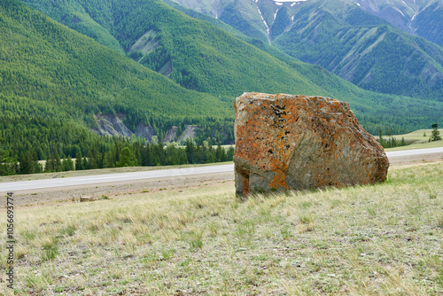 A stone by the road in the Altai Mountains. Siberia, Russia photo