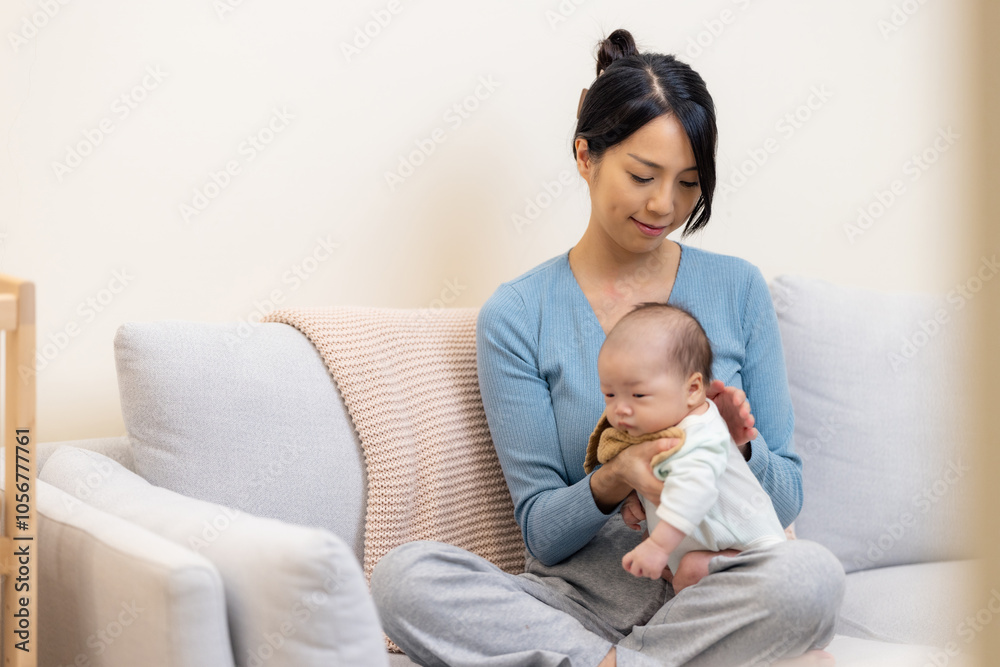 Mom help baby to burp after feed milk at home Mom help baby to burp after feed milk at home
